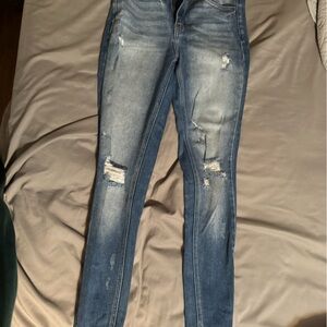 Distressed Blue Denim Jeans